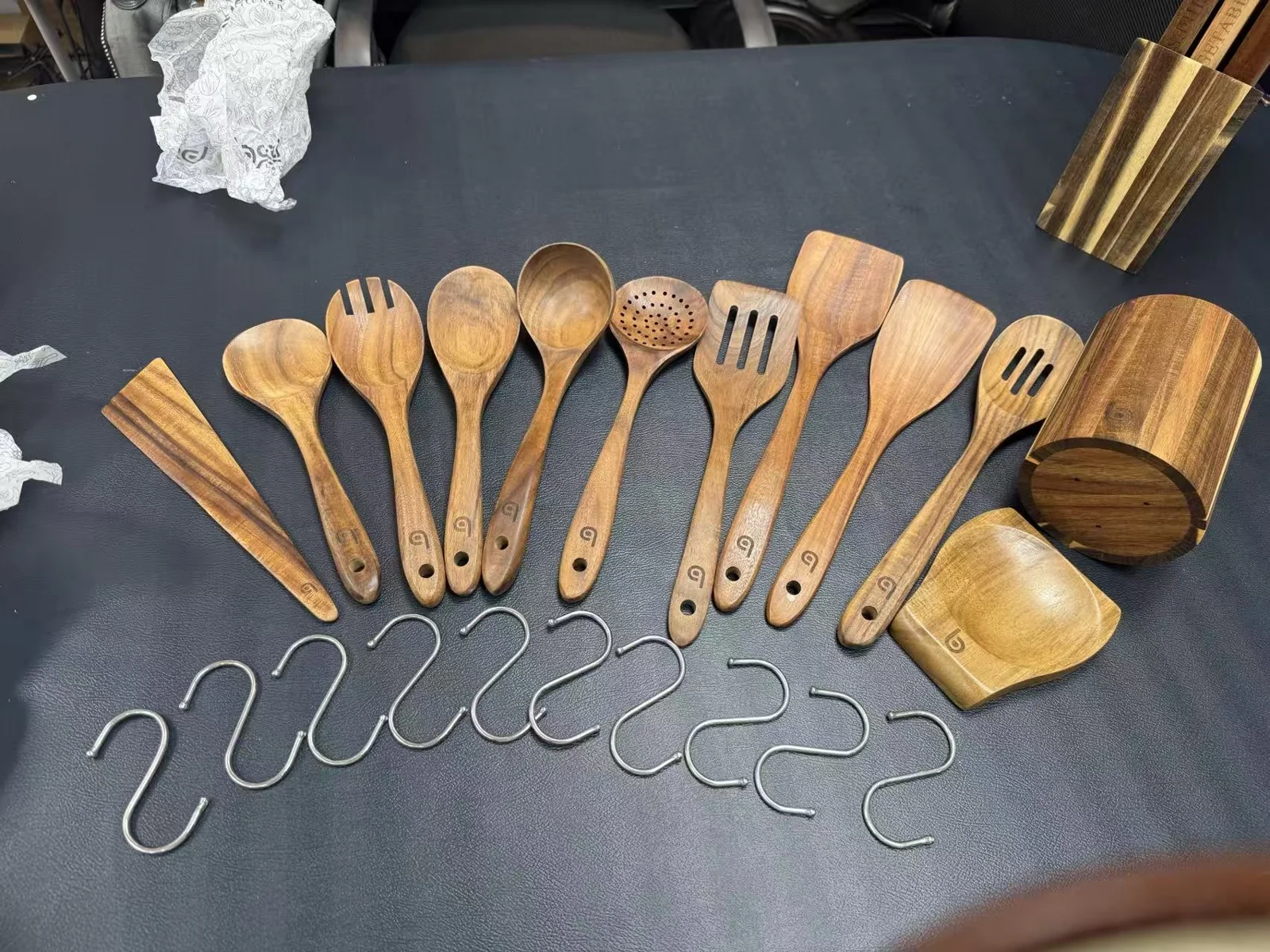 Wooden kitchen utensils arranged on a table